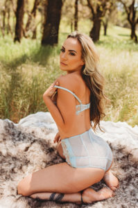 Jackson boudoir photography woman outdoors in nature in bridal blue lingerie