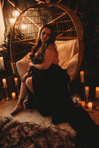 Folsom boudoir fine art implied nude photography woman in satin sheet