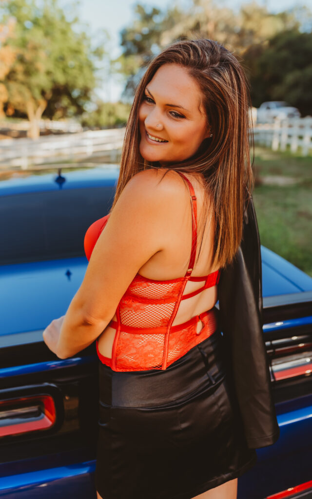 Outdoor Boudoir Photoshoot in Carmichael, California with Woman in red lace lingerie and dodge hellcat - Limitless Boudoir