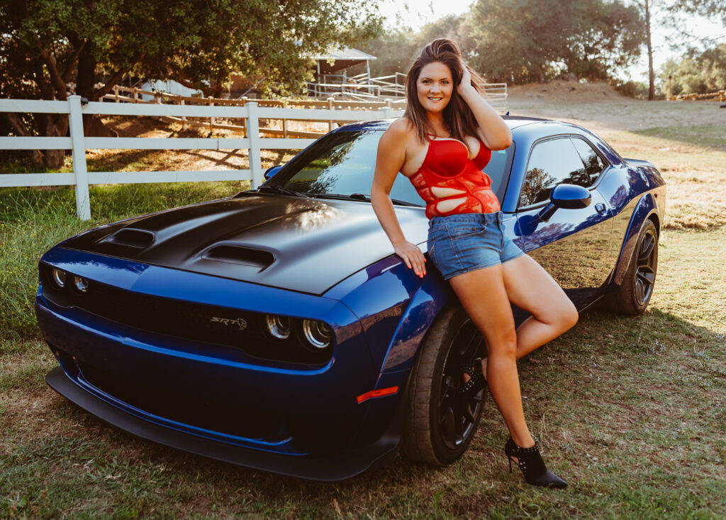 Outdoor Boudoir Photoshoot in Carmichael, California with Woman in red lace lingerie and dodge hellcat - Limitless Boudoir