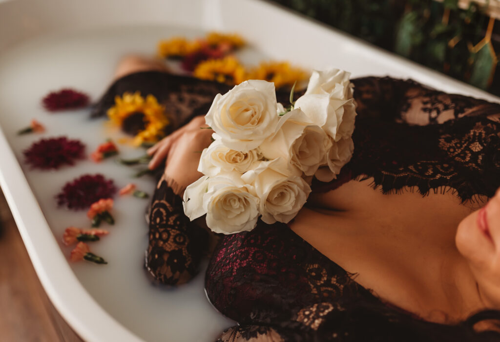 Close-up of delicate floral arrangement in oat milk bath, representing purity and eternal love for angel baby